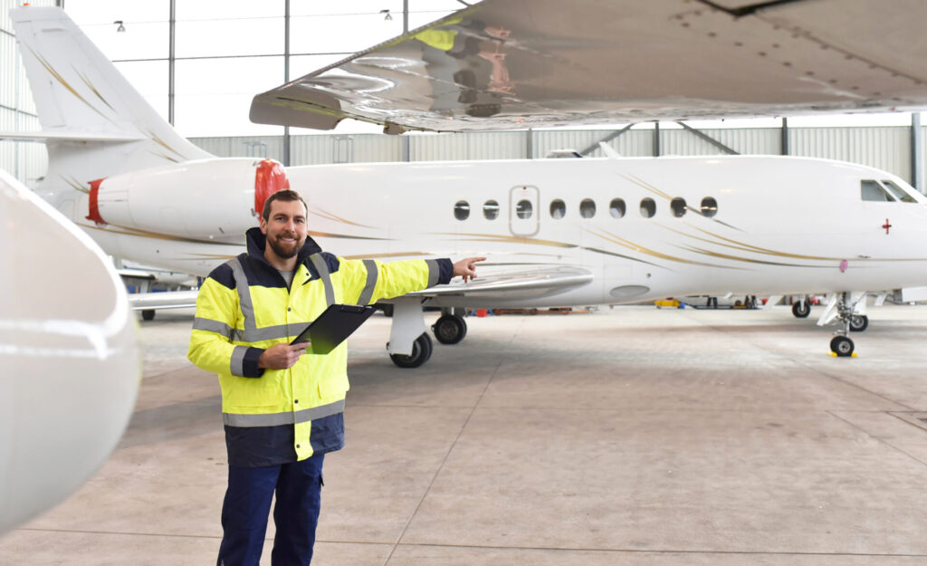 wyvern-airport-workers-check-aircraft-safety-hangar